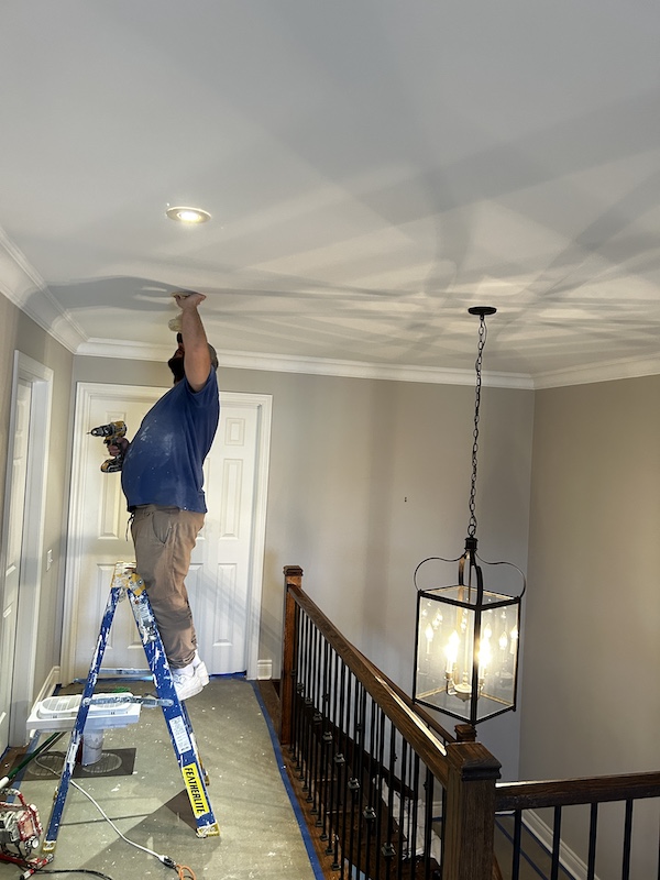 Smooth ceiling with recessed lights installed