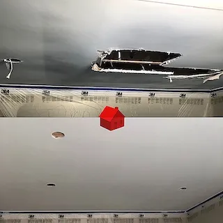 Hamilton ceiling water damage drywall repair with seamless finish