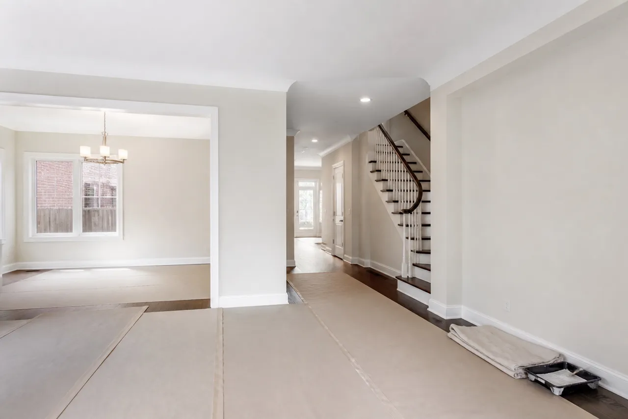 House painter Mississauga whole-home interior with protected hardwood floors and freshly painted connected rooms
