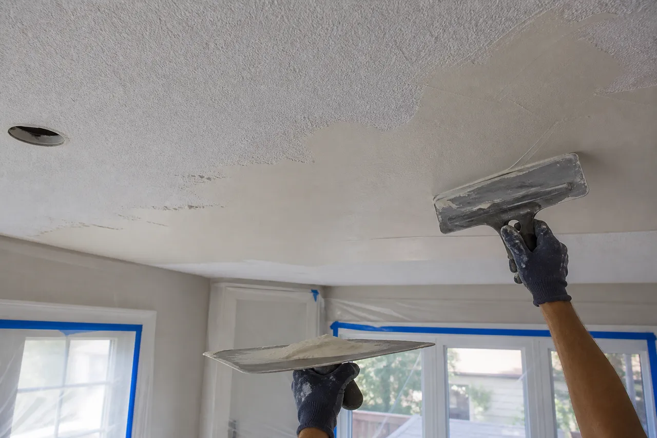 Skim coating process after painted popcorn ceiling prep