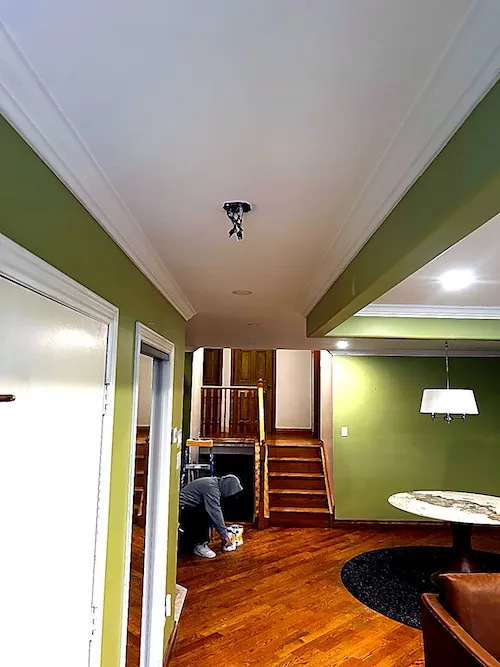 Smooth finished ceiling after popcorn removal and skim coating in Hamilton