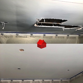 Water damaged drywall repair after leak - emergency ceiling water damage restoration